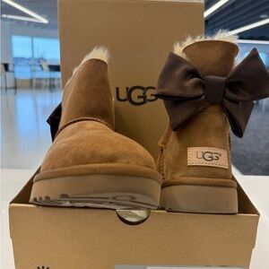UGG Chestnut Suede Mini Boots with Bow and Shearling